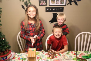 The kids decorating their kits, well.. Cam was more climbing at this point.